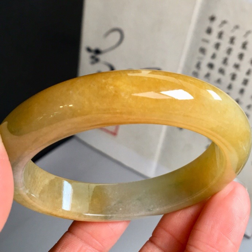 冰种鸡油黄正圈手镯(53mm)翡翠