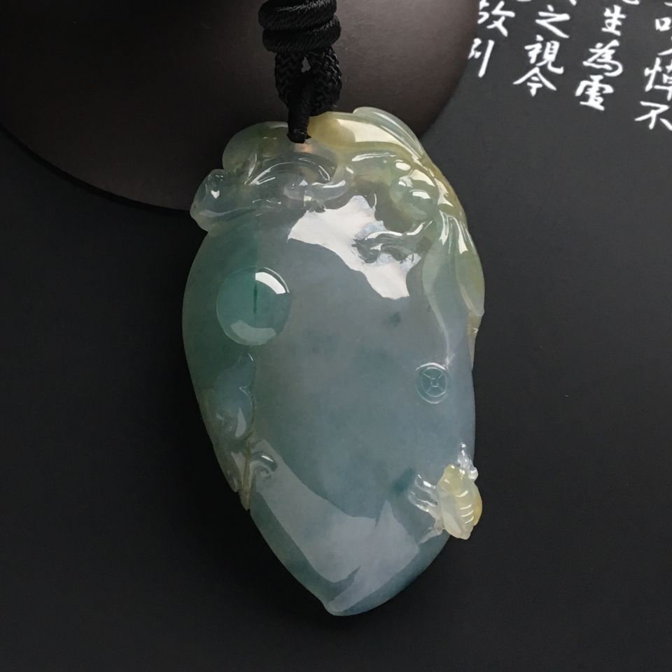 糯冰种飘花带褐黄翡福瓜挂件