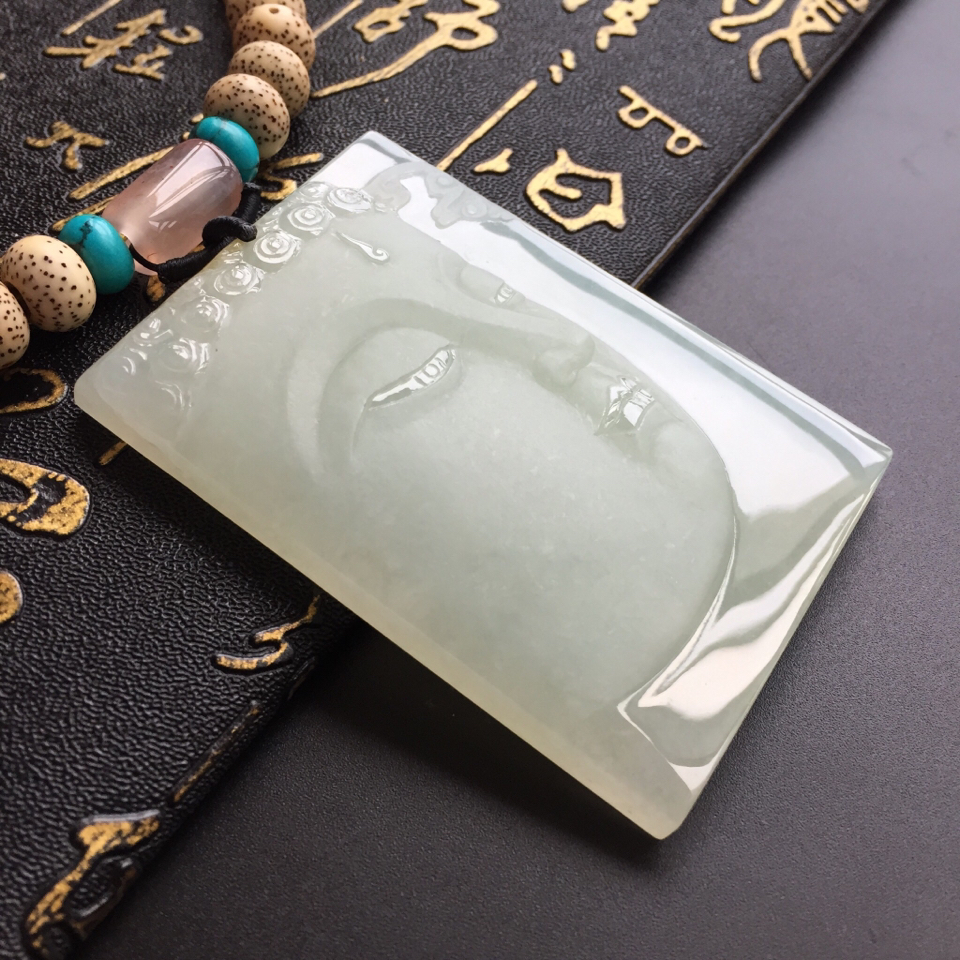糯冰种晴水略飘黄翡翡翠释迦牟尼头挂件
