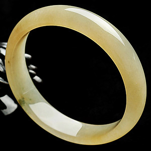 冰种黄翡略飘花手镯(55.2mm)