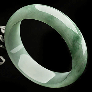 糯冰种略飘花手镯(57.3mm)
