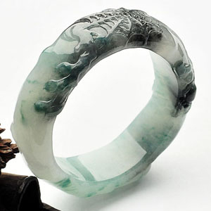 冰种飘花一往情深雕花贵妃镯(56.3mm-48.7mm)