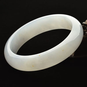 糯冰种晴水略飘黄翡手镯(55.7mm)