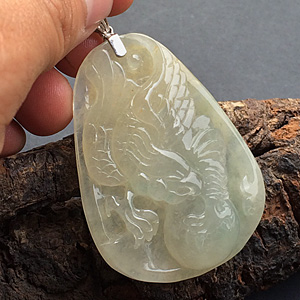 冰种淡黄翡略飘花大展宏图挂件