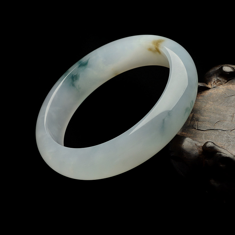 糯冰种飘花略带褐黄翡手镯（56.7mm ）
