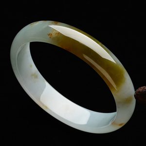 (超值推荐)糯冰种晴水褐黄翡飘花贵妃镯(54.7mm-49.8mm)