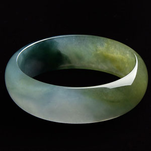 糯冰种褐黄翡飘花贵妃镯（58.4mm-52.8mm）