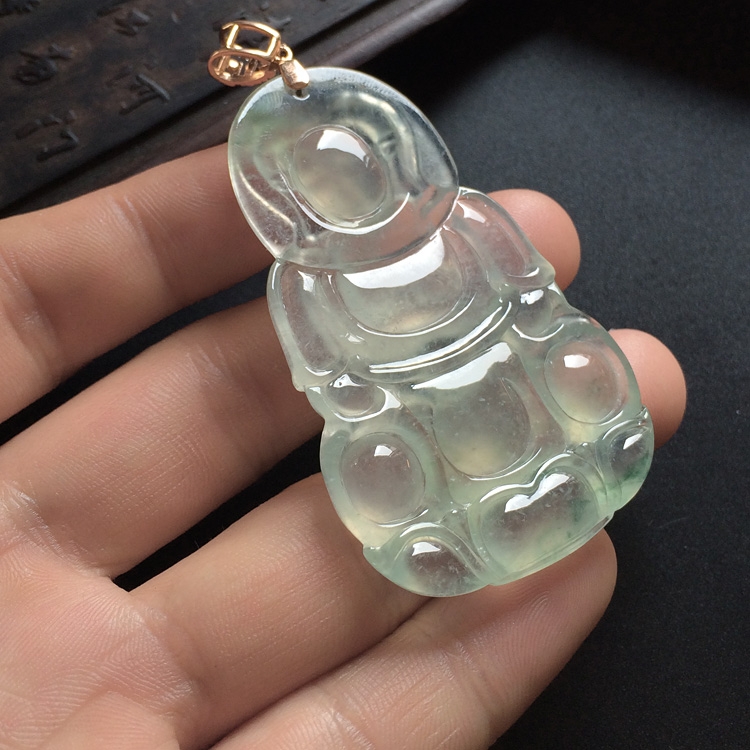 冰玻种晴水略飘花观音挂件