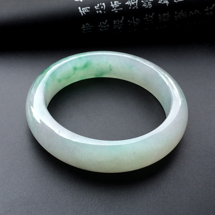 糯冰种略飘花手镯(57.3mm)