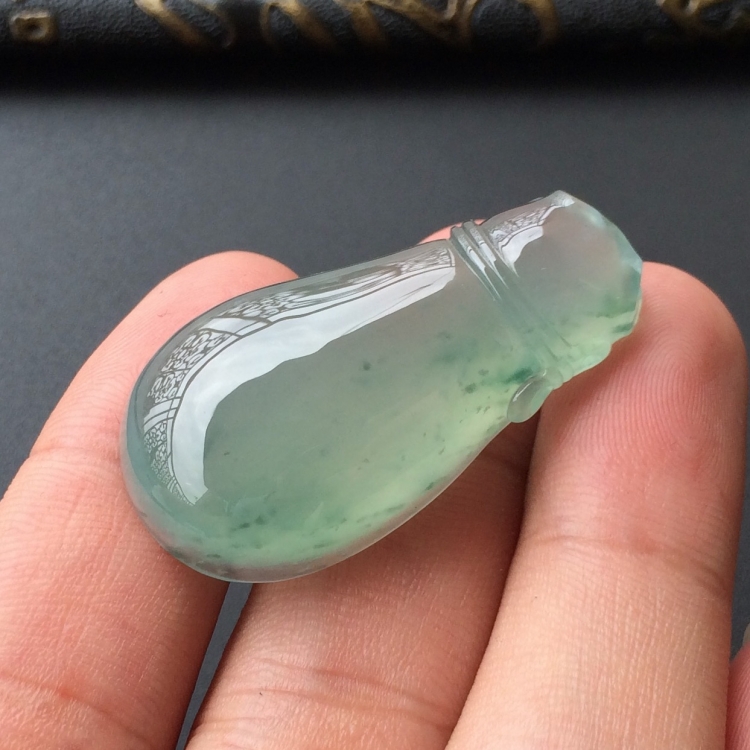 (超值推荐)冰种晴水略飘花钱袋胸坠面