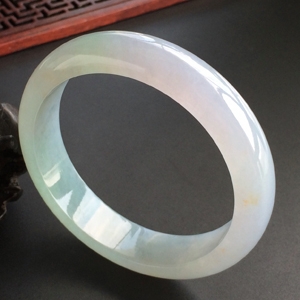 (超值推荐)糯冰种晴水略飘黄花手镯(57mm)