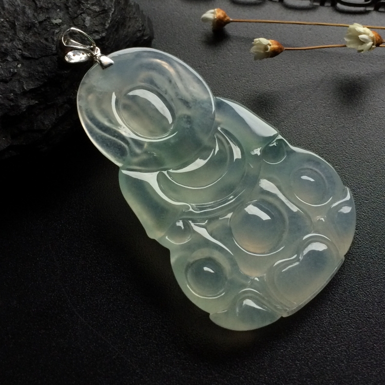 （超值推荐）冰种略飘花观音挂件（金扣）