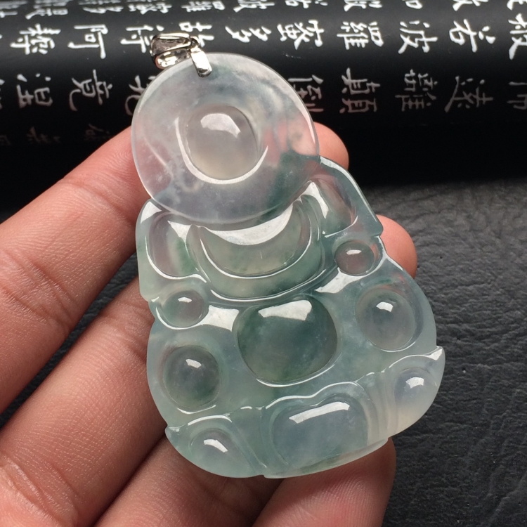 （超值推荐）冰种飘花观音挂件（金扣）