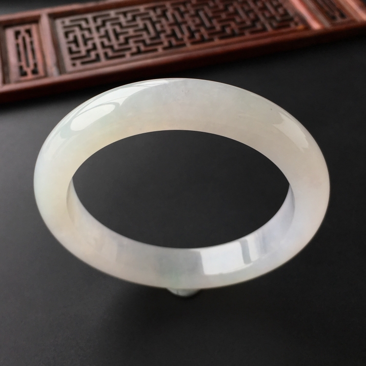 (超值推荐)冰种淡晴水略飘花手镯(57.7mm)