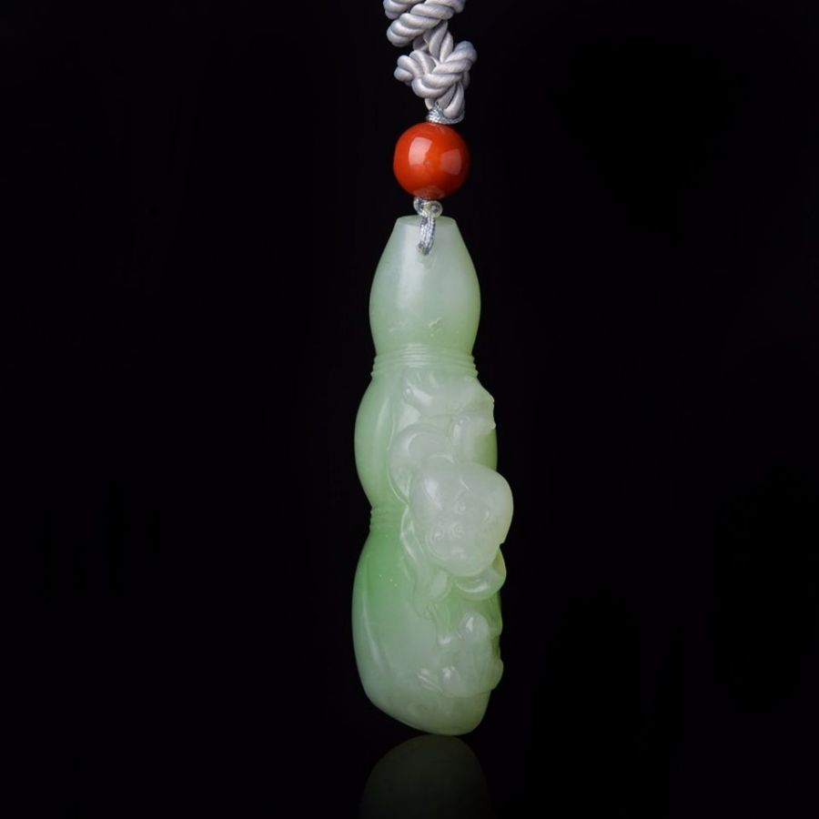 水胆玛瑙手把件 在盘玩和田玉手把件时