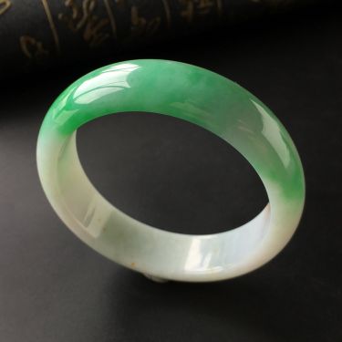 （超值推荐）糯冰种飘翠带黄花手镯(57.5mm)